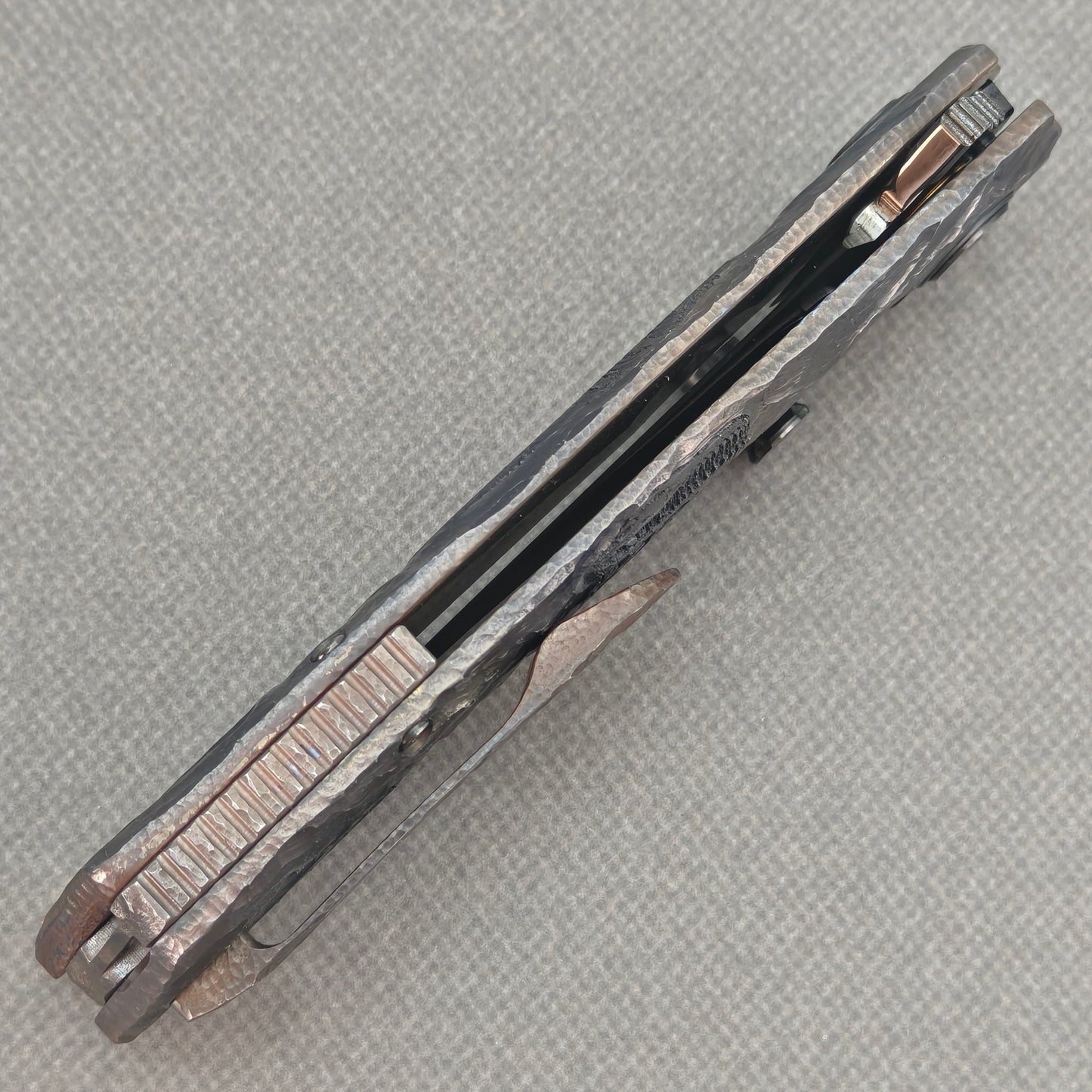 VORIXN Rex KB119 Folding Knife – closed side construction view showing pocket clip, spacer, and titanium handle layers