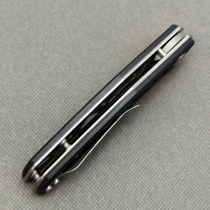 VORIXN KA003 closed side construction view showing pocket clip, spacer, and handle layers.