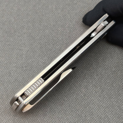 VORIXN KB062 closed side construction view showing pocket clip, spacer, and titanium handle layers.