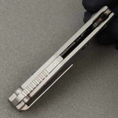 VORIXN Yokai KB106 Folding Knife – closed side construction view showing pocket clip, spacer, and handle layers