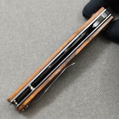 VORIXN KA013 Folding Knife – closed side construction view showing pocket clip, spacer, and handle layers