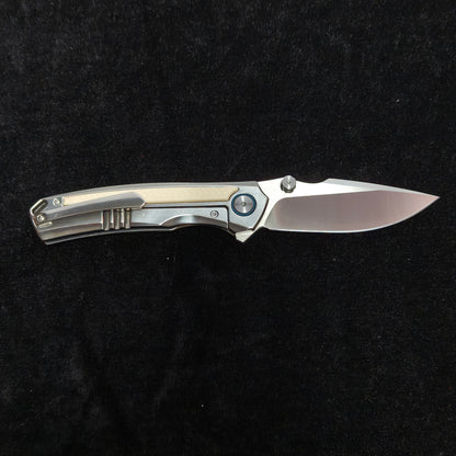 VORIXN LUCENT folding knife open, non-clip side, blade horizontal, clip side