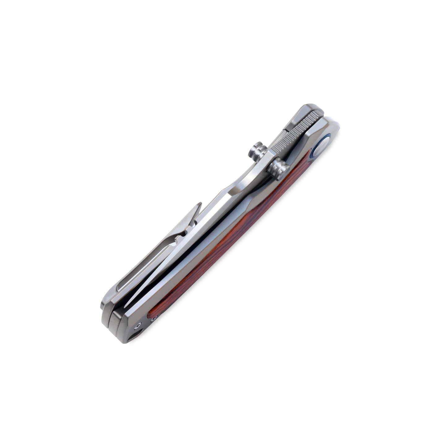 VORIXN Ironwood Crest folding knife closed at an angle, blade spine facing upward with refined titanium ironwood handle