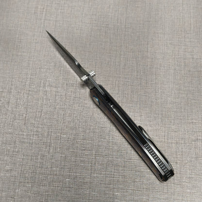 VORIXN Topograph folding knife open, top-down view from the spine showing blade alignment