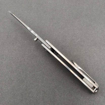 VORIXN KB059 open spine-side structure showing blade alignment and pearl inlaid handle thickness.