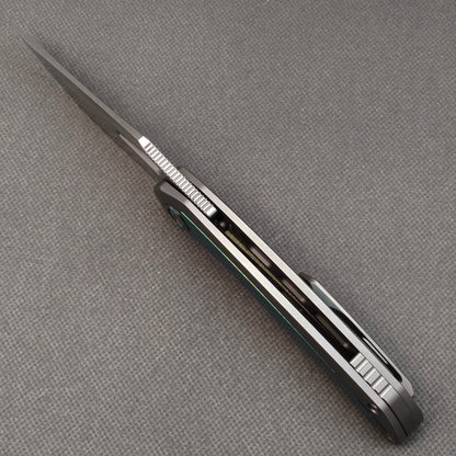 Couteau pliant RIHE Design, manche titane + titane cristallisé (lame Bohler M398 de 3,7") KB076