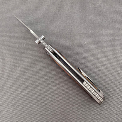 VORIXN KB040 open spine-side structure showing blade alignment and titanium and ironwood handle thickness.