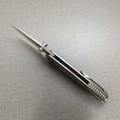 VORIXN Ocean Mirage folding knife open, front view from the spine showing blade alignment and handle balance