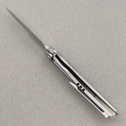VORIXN Carbon Crest KB003 Folding Knife – open edge side locking structure showing frame lock and inner construction