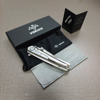 VORIXN folding knife packaging including drawstring pouch, care instruction card, and microfiber cleaning cloth