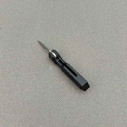 VORIXN NA001 Super Tiny Folding Knife – partially open view showing flipper and pivot mechanism