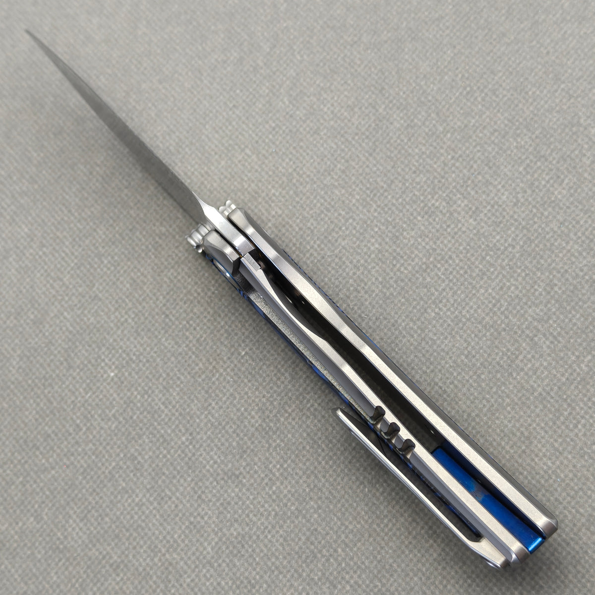 VORIXN Tidecipher KB157 Folding Knife – open edge-side view showing frame lock engagement and inner handle construction.