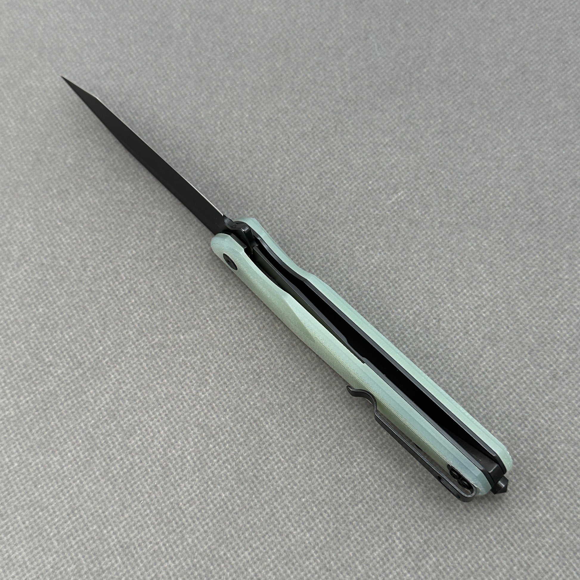 VORIXN KM005 open edge-side locking structure showing liner lock area and inner handle construction.