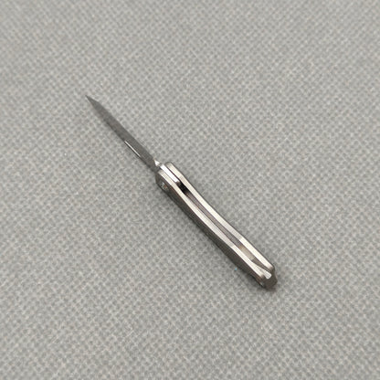 VORIXN NA002 Super Tiny Folding Knife – partially open view showing flipper and pivot mechanism