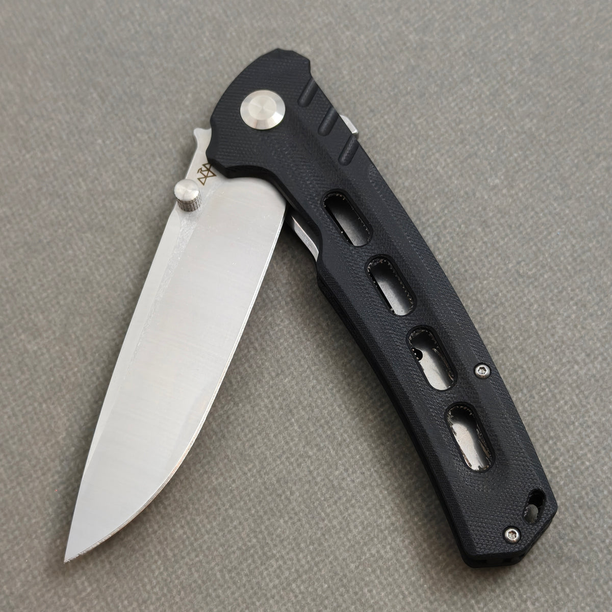 VORIXN KA001 Folding Knife – partially open EDC view showing flipper, thumb stud, pivot, and Stainless Steel & G10 handle profile