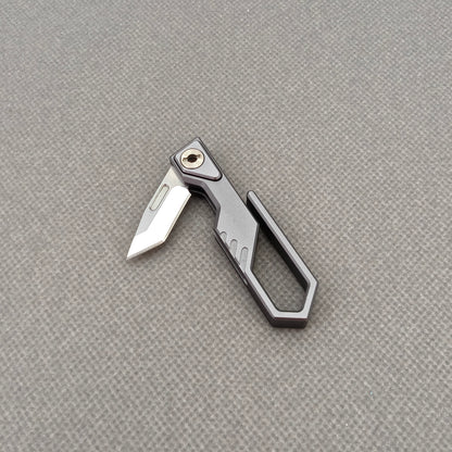 VORIXN NA005 Super Tiny Folding Knife – overall product view with scale reference