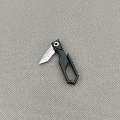 VORIXN NA001 Super Tiny Folding Knife – overall product view with scale reference