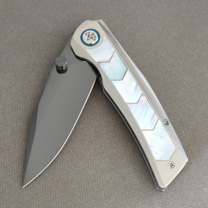 VORIXN Pearlcrest KB158 Folding Knife – partially open view showing dark blade, thumb stud, and mother-of-pearl inlays.