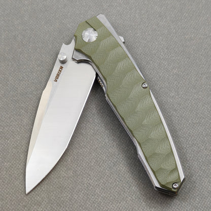VORIXN KA007 Folding Knife – partially open EDC view showing flipper, thumb stud, pivot, and Stainless Steel & G10 handle profile