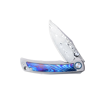VORIXN Nebula knife half-open position, showing pivot details and titanium handle with flame-burned zirconium inlay.