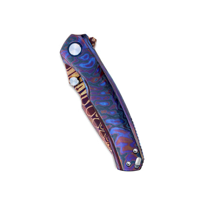 VORIXN TimsFlame folding knife closed non-clip side showing flame Timascus handle pattern