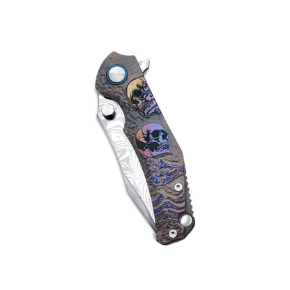 VORIXN KB036 knife closed, showing the titanium handle pattern and full profile on the non-clip side.