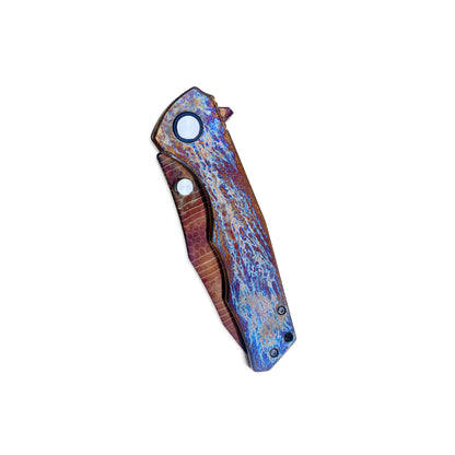 VORIXN ZircFlame KB020 knife closed, non-clip side, showing handle pattern and shape