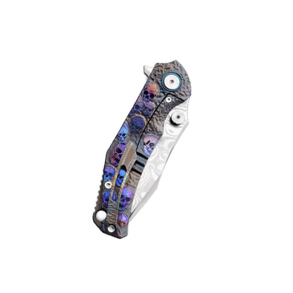 VORIXN KB036 knife closed, showing the titanium handle pattern and full profile on the pocket-clip side.