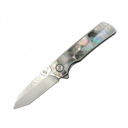 Vorixn Forest Mirage folding knife open on non-clip side with Damascus blade angled 45 degrees downward, showcasing mother of pearl inlaid titanium handle