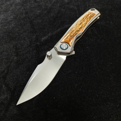 VORIXN AURON folding knife open, show side view with natural stag inlay and VG10 blade