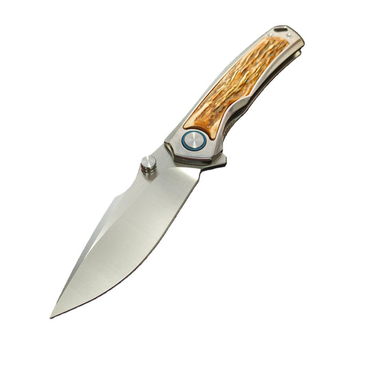VORIXN Auron titanium folding knife open view, non clip side, VG10 blade angled 45 degrees downward, natural stag inlay handle detail