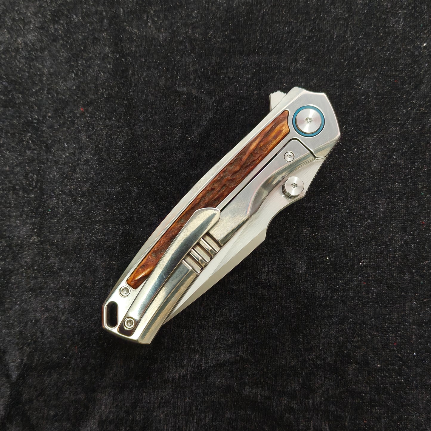 VORIXN AURON folding knife closed, pocket clip side view with titanium handle and refined finish