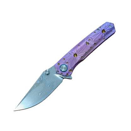VORIXN Impact Origin titanium Damascus folding knife open, non-clip side, blade angled 45 degrees downward