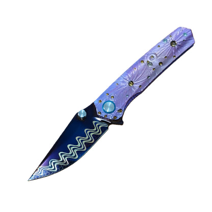 VORIXN Impact Origin titanium Damascus folding knife open, non-clip side, blade angled 45 degrees downward