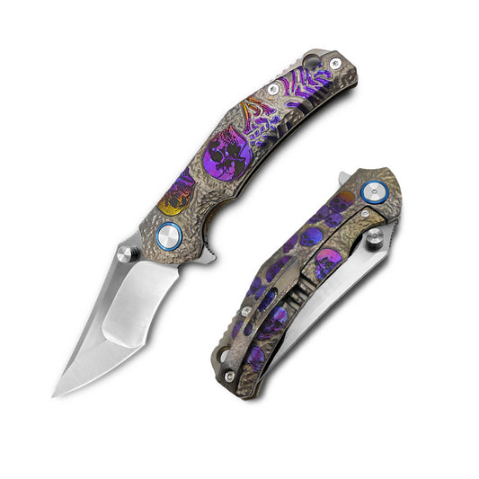 Hand engraved titanium handle of VORIXN Eclipse folding knife with blue and gold anodized finish